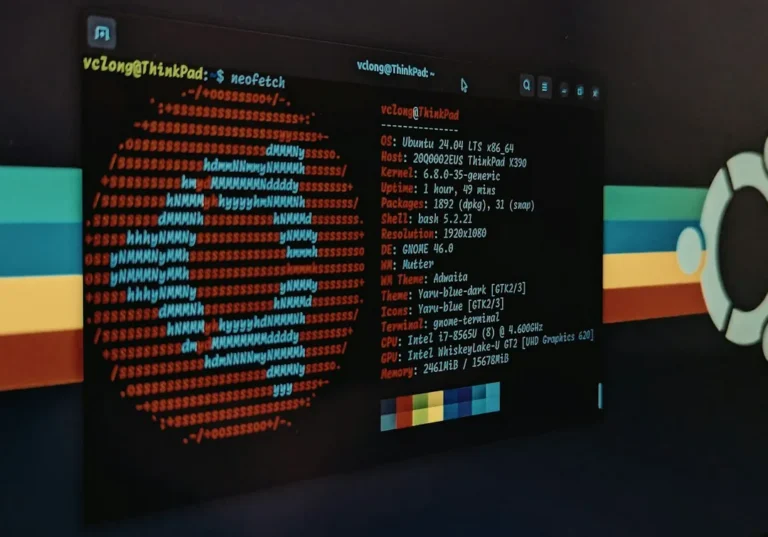 A computer screen displaying system information and an Ubuntu logo in a terminal window